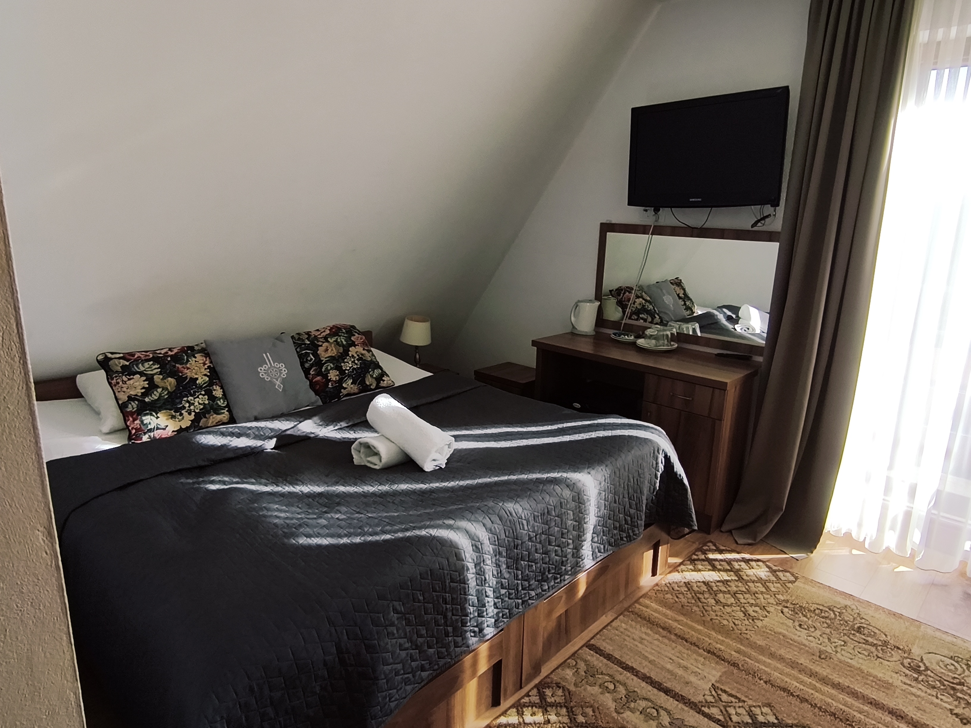 Pokój czteroosobowy z balkonem